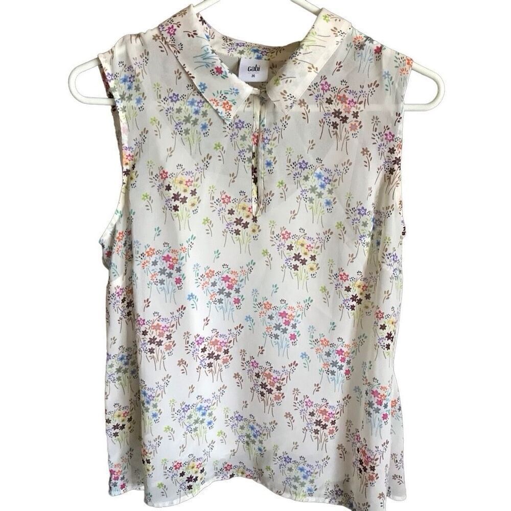 CAbi floral top sleeveless size Medium cream cami underneath semi sheer